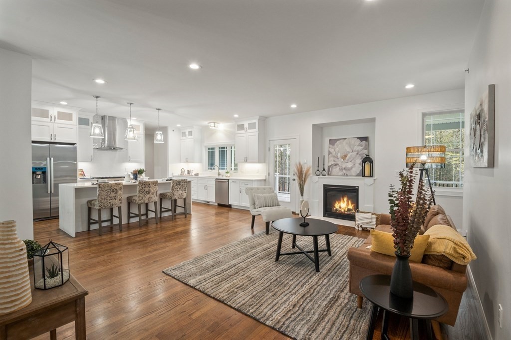5 Squire Drive Wilbraham, MA 01095 - Photo 12 of 42 a living room with furniture and a fireplace