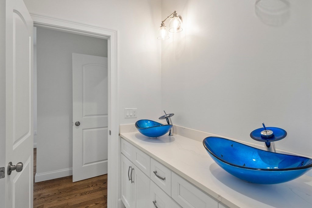 5 Squire Drive Wilbraham, MA 01095 - Photo 14 of 42 a kitchen with a sink and a mirror