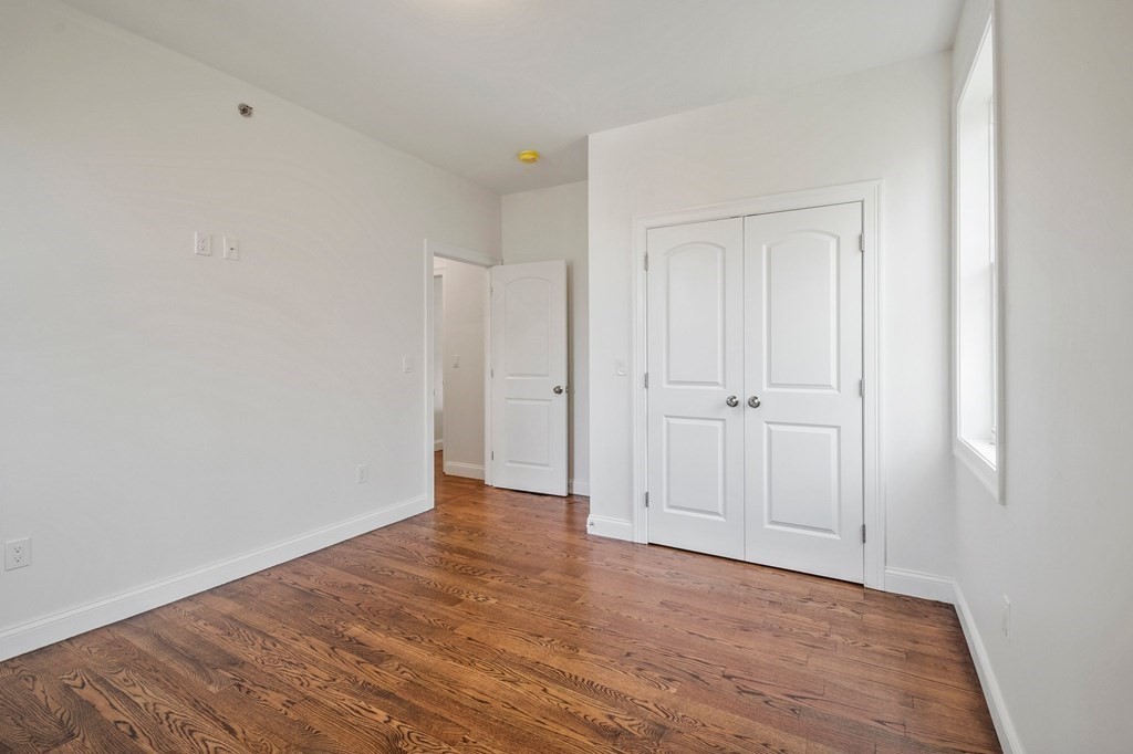 5 Squire Drive Wilbraham, MA 01095 - Photo 19 of 42 a view of an empty room with wooden floor