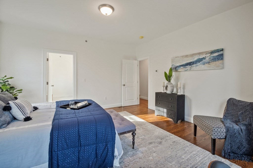 5 Squire Drive Wilbraham, MA 01095 - Photo 23 of 42 a bedroom with furniture and a potted plant