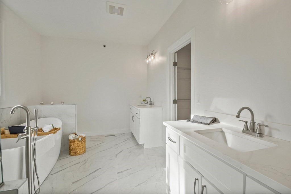 5 Squire Drive Wilbraham, MA 01095 - Photo 24 of 42 a bathroom with a sink and mirror