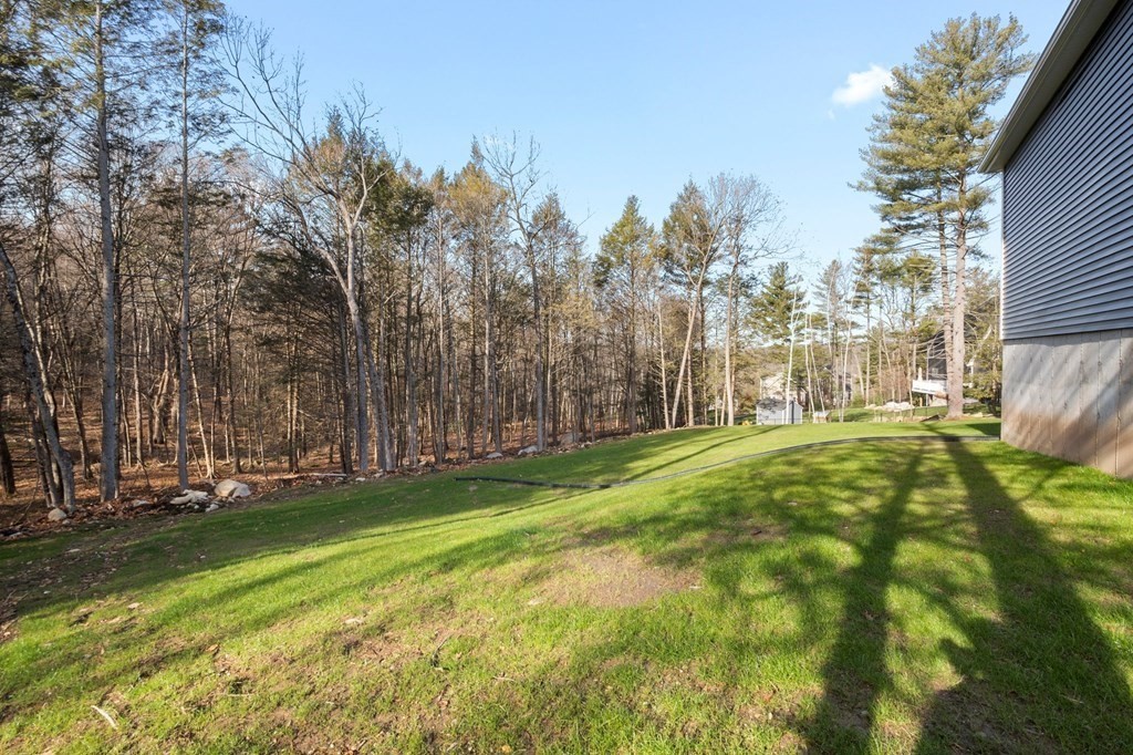 5 Squire Drive Wilbraham, MA 01095 - Photo 38 of 42 a backyard of a house with lots of green space