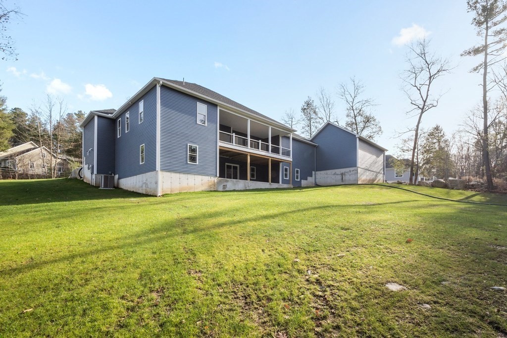5 Squire Drive Wilbraham, MA 01095 - Photo 40 of 42 a house view with swimming pool in front of it