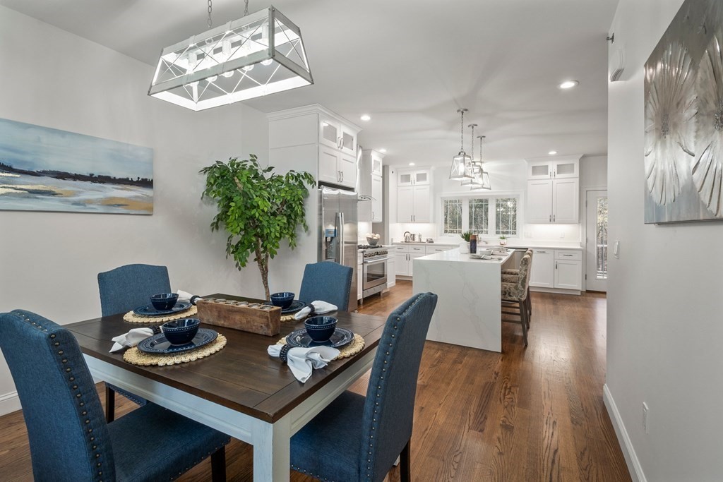 5 Squire Drive Wilbraham, MA 01095 - Photo 4 of 42 a dining room with furniture a chandelier and wooden floor