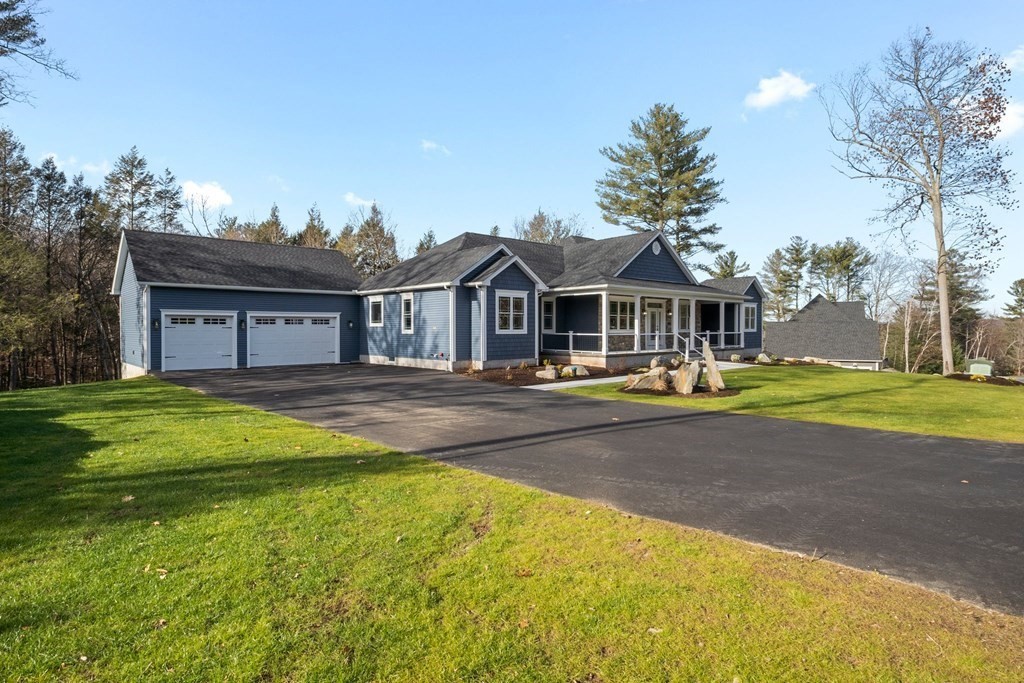 5 Squire Drive Wilbraham, MA 01095 - Photo 41 of 42 a front view of a house with a yard