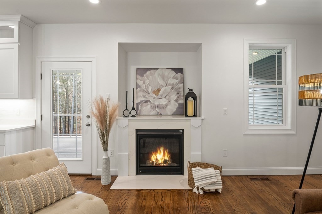 5 Squire Drive Wilbraham, MA 01095 - Photo 10 of 42 a living room with furniture and a fireplace