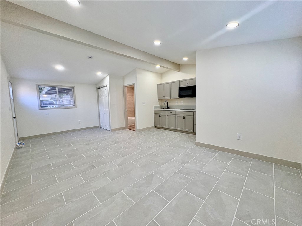 4585 Hawthorne Street, Unit B Montclair, CA 91763 - Photo 3 of 6 a view of a kitchen with a sink