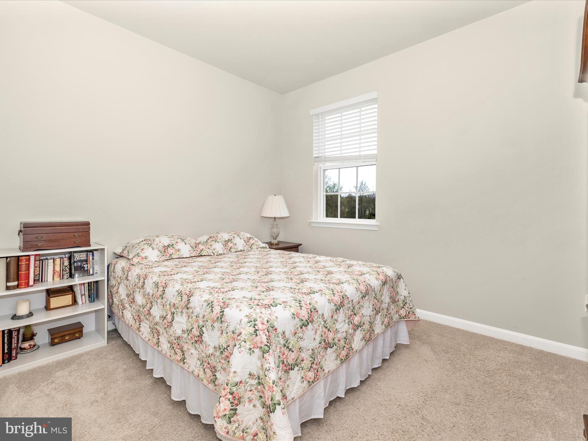 2088 Pomona Way Frederick, MD 21702 - Photo 19 of 55 a bedroom with a bed and a window