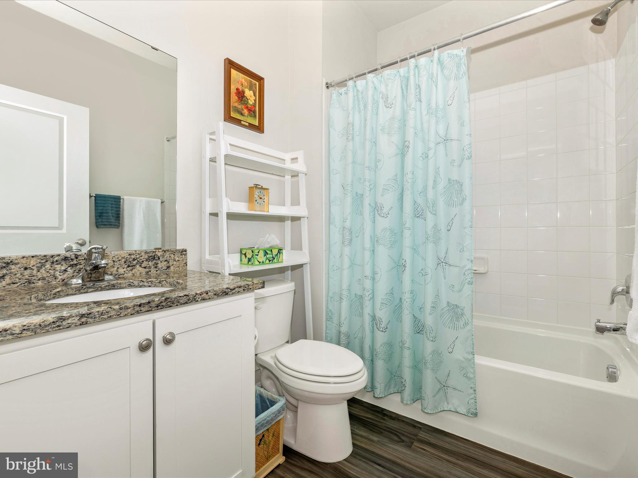 2088 Pomona Way Frederick, MD 21702 - Photo 21 of 55 a bathroom with a granite countertop sink a toilet and a bathtub