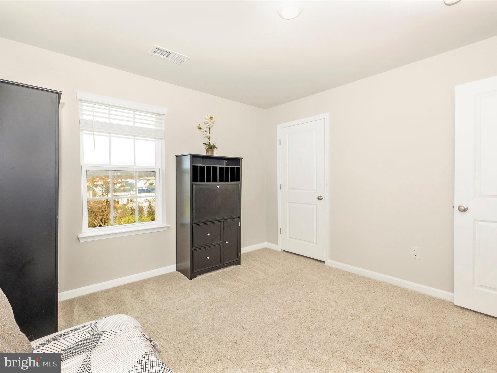 2088 Pomona Way Frederick, MD 21702 - Photo 28 of 55 a view of livingroom with furniture and window