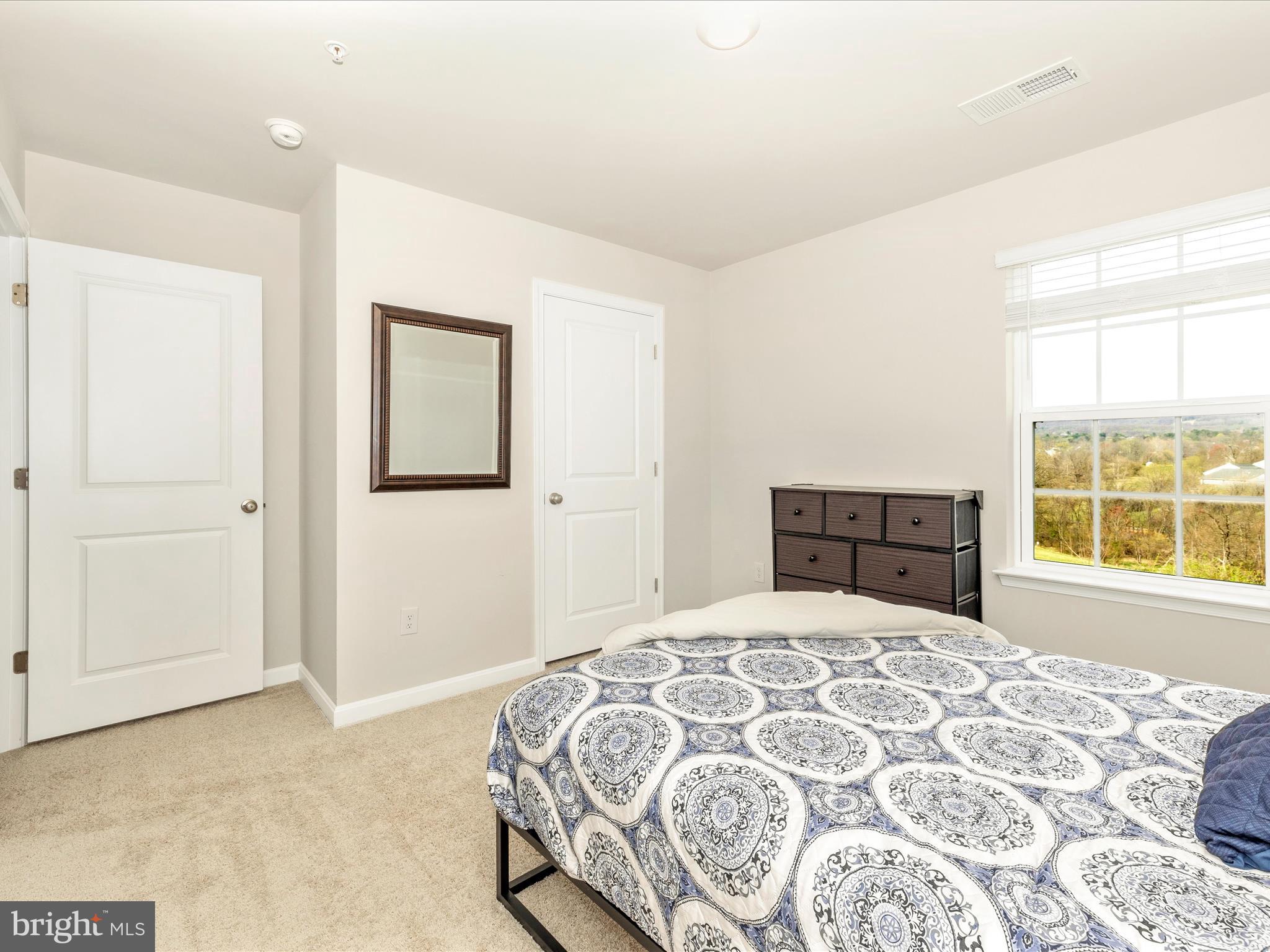 2088 Pomona Way Frederick, MD 21702 - Photo 30 of 55 a bedroom with a large bed and a window