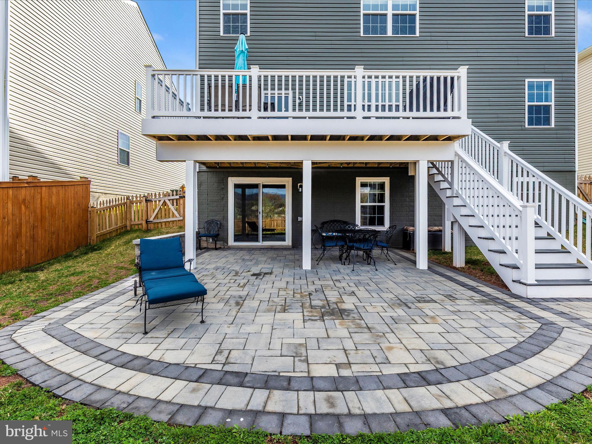 2088 Pomona Way Frederick, MD 21702 - Photo 41 of 55 a view of a house with a patio and a yard