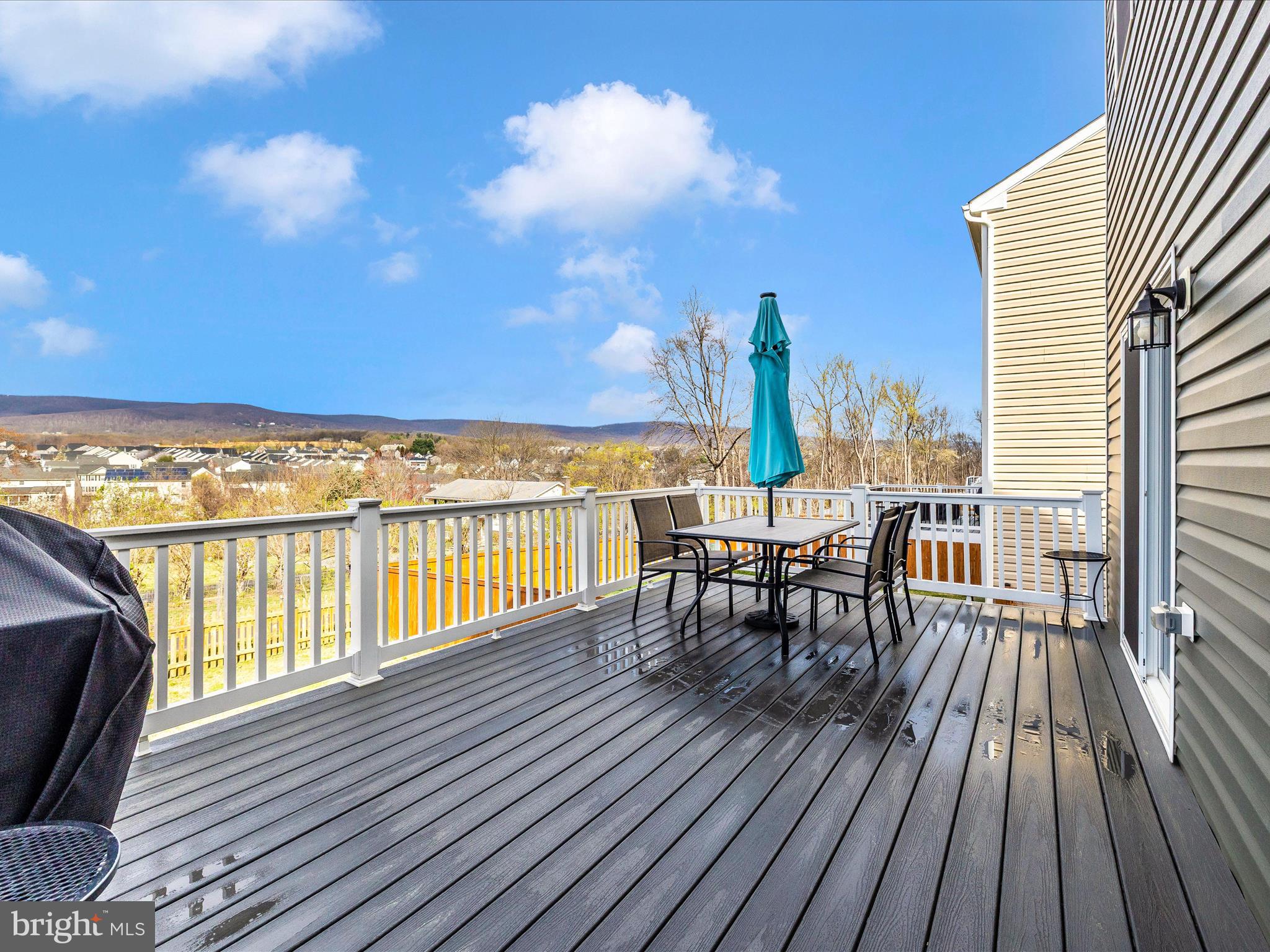 2088 Pomona Way Frederick, MD 21702 - Photo 46 of 55 a view of a balcony with furniture and wooden floor