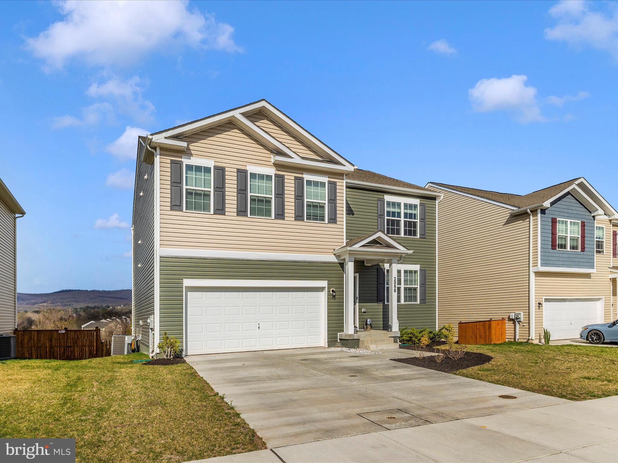 2088 Pomona Way Frederick, MD 21702 - Photo 47 of 55 a front view of a house with a yard