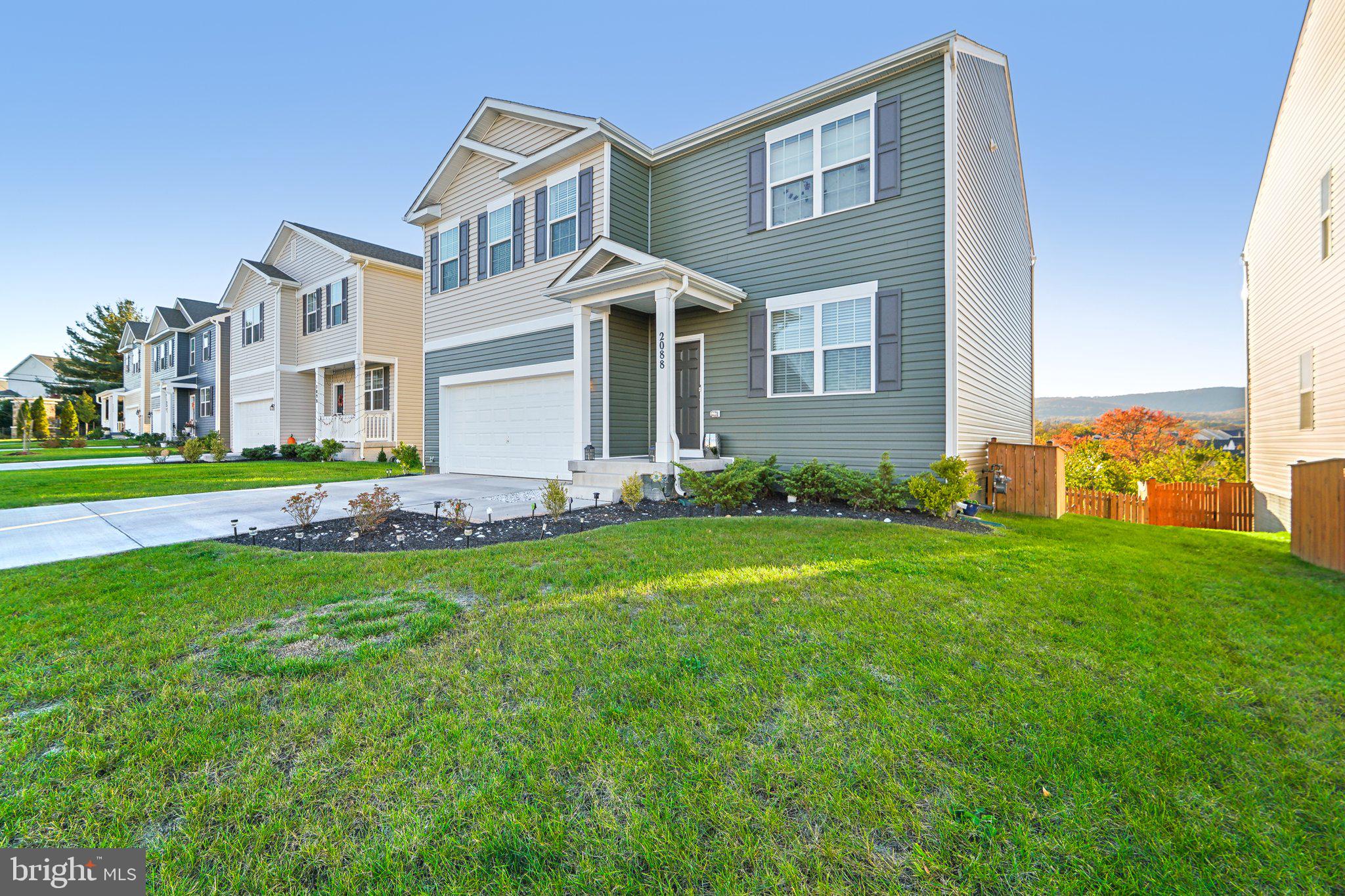 2088 Pomona Way Frederick, MD 21702 - Photo 48 of 55 a front view of house with yard and green space