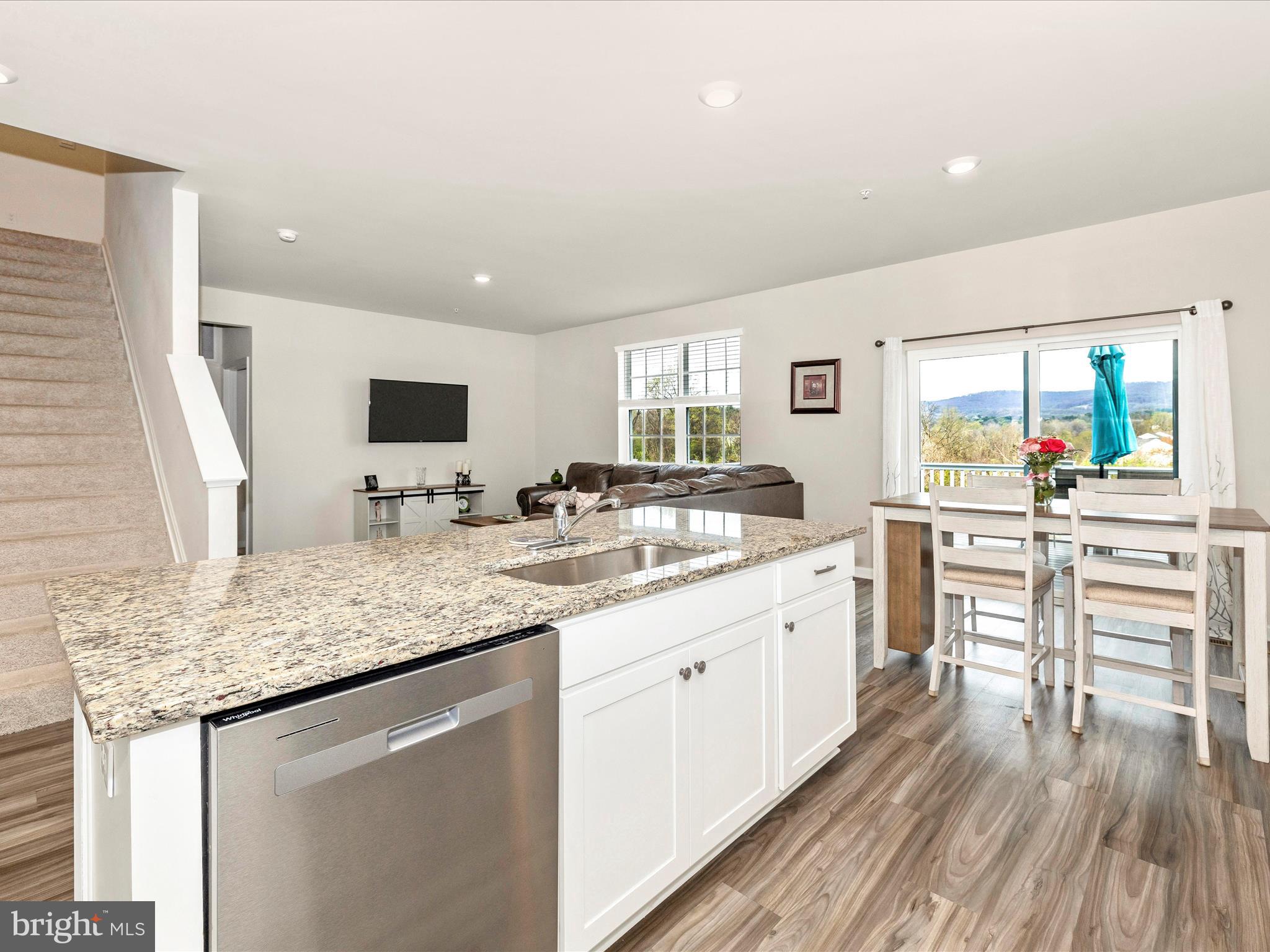 2088 Pomona Way Frederick, MD 21702 - Photo 6 of 55 a kitchen with stainless steel appliances granite countertop a sink stove and cabinets
