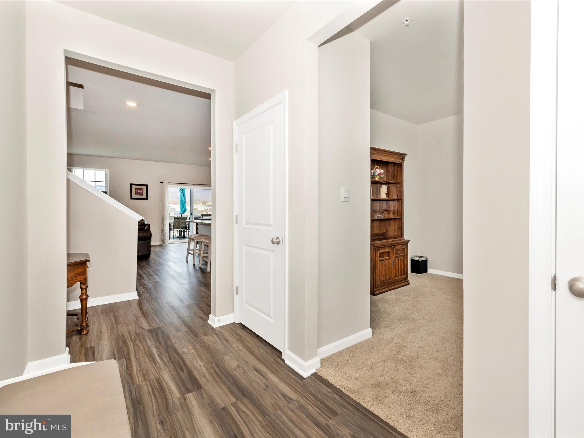 2088 Pomona Way Frederick, MD 21702 - Photo 8 of 55 a view interior of the house and hallway with wooden floor