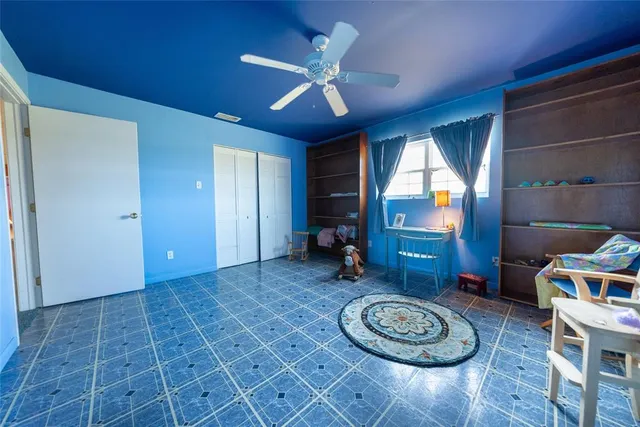 a view of a livingroom with furniture and rug