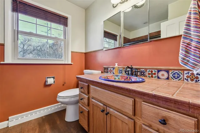 a bathroom with a tub and shower