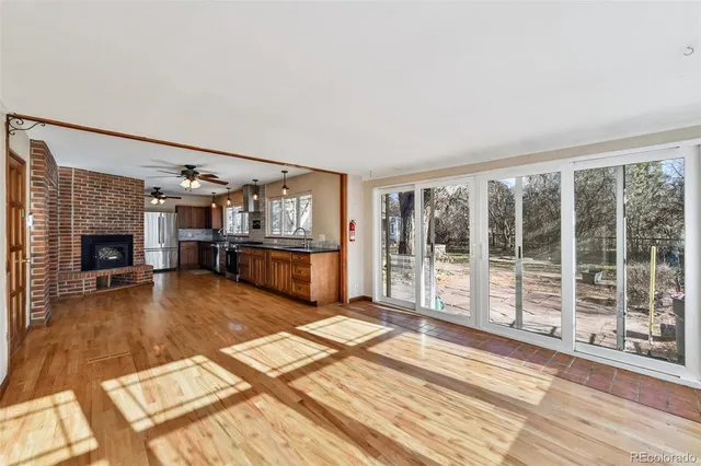 a view of kitchen with furniture and large window