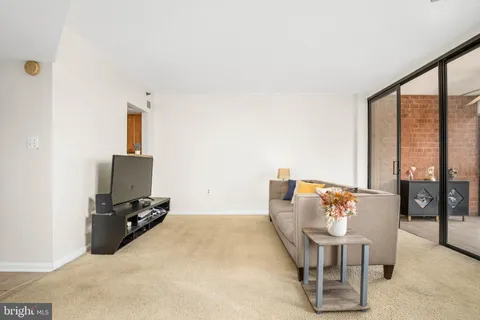 a view of workspace with furniture and window