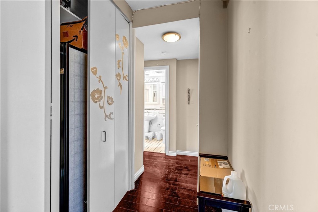 969 Hilgard Avenue, Unit 706 Los Angeles, CA 90024 - Photo 17 of 27 a view of a hallway with wooden floor