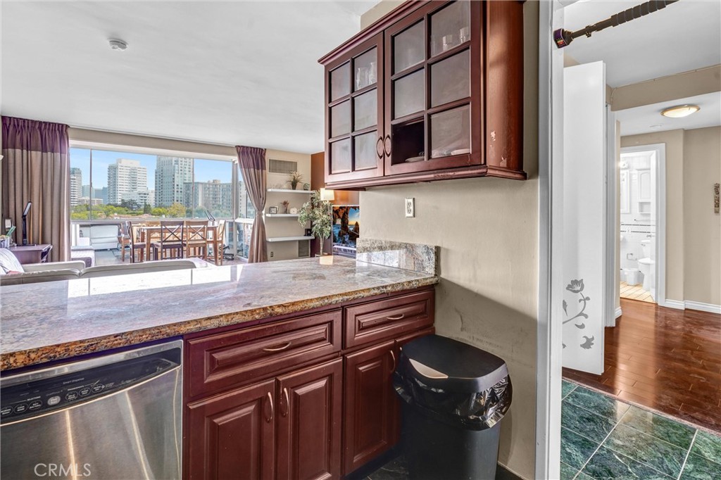 969 Hilgard Avenue, Unit 706 Los Angeles, CA 90024 - Photo 10 of 27 a kitchen with a sink and cabinets