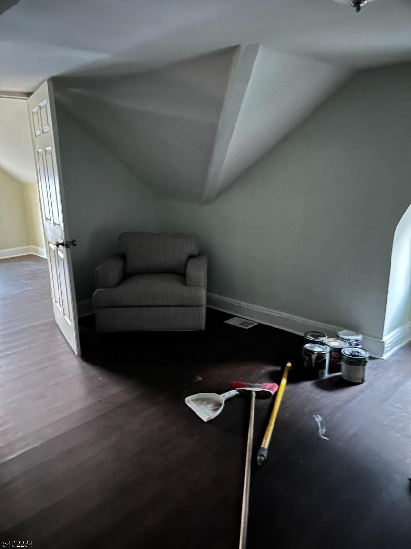 49 Orchard Street Elizabeth, NJ 07208 - Photo 2 of 6 a living room with furniture a air conditioner vent and a window