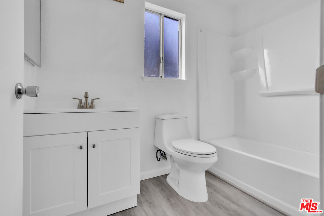 3401 Matterhorn Way Ceres, CA 95307 - Photo 32 of 33 a bathroom with a sink toilet and vanity