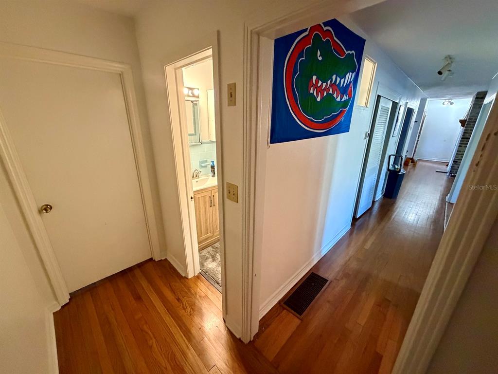 111 Southwest 23rd Terrace Gainesville, FL 32607 - Photo 17 of 22 a view of a hallway with painted walls