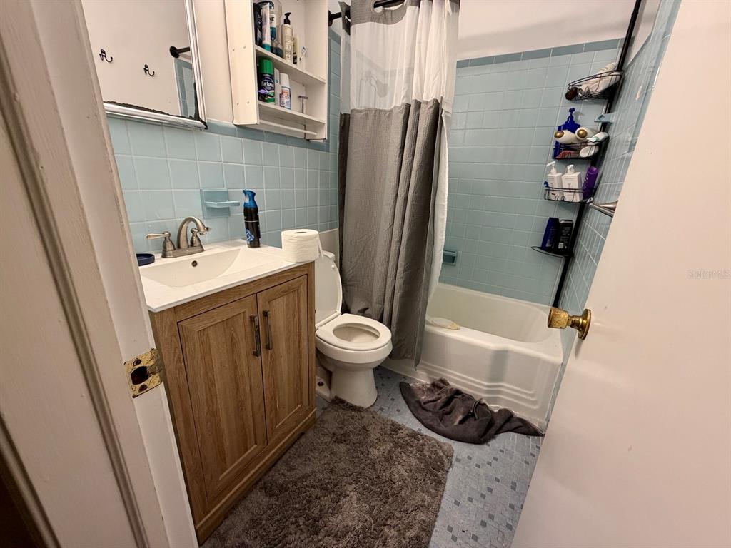 111 Southwest 23rd Terrace Gainesville, FL 32607 - Photo 20 of 22 a bathroom with a sink toilet and shower
