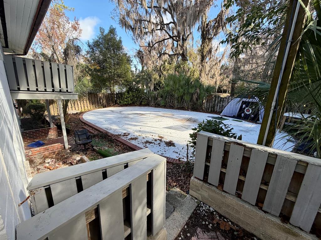 111 Southwest 23rd Terrace Gainesville, FL 32607 - Photo 10 of 22 a view of a balcony with wooden floor