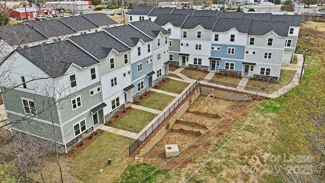 a view of building with yard