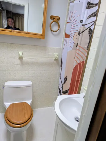 a bathroom with a toilet and a sink