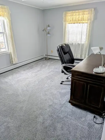 a room with furniture and windows