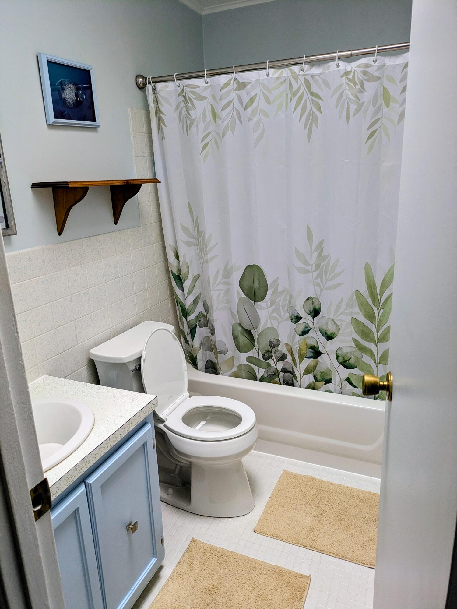 1606 Daniels Run Road Northeast Check, VA 24072 - Photo 7 of 14 a white toilet sitting next to a white sink and vanity