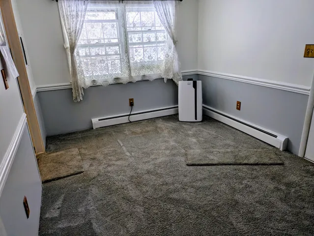 a view of a window in an empty room