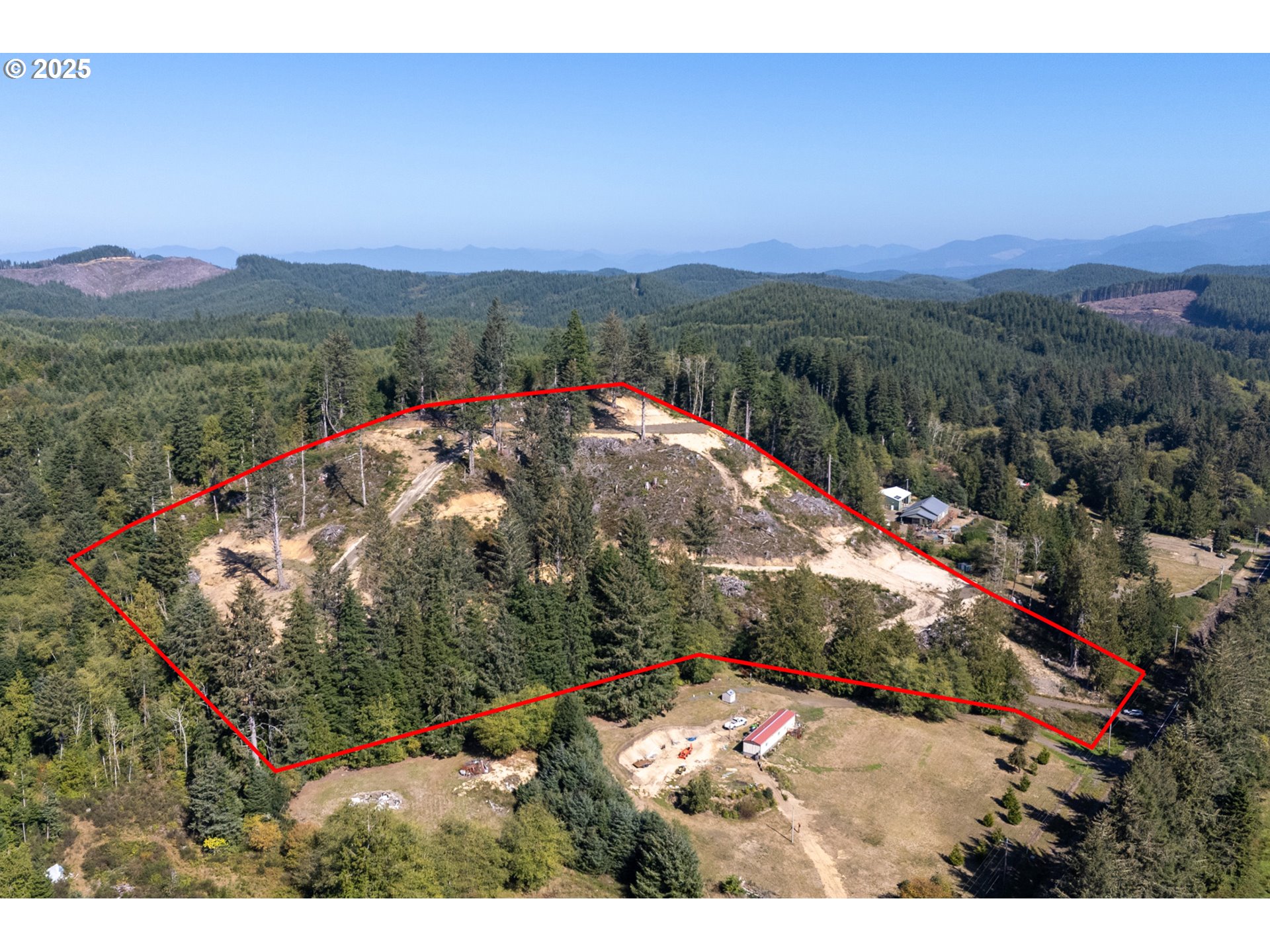 Sandlake Road, Unit 1207 Cloverdale, OR 97112 - Photo 2 of 37 a view of a city with mountains in the background