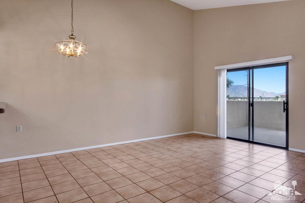 34041 Emily Way Rancho Mirage, CA 92270 - Photo 11 of 25 a view of an empty room with window