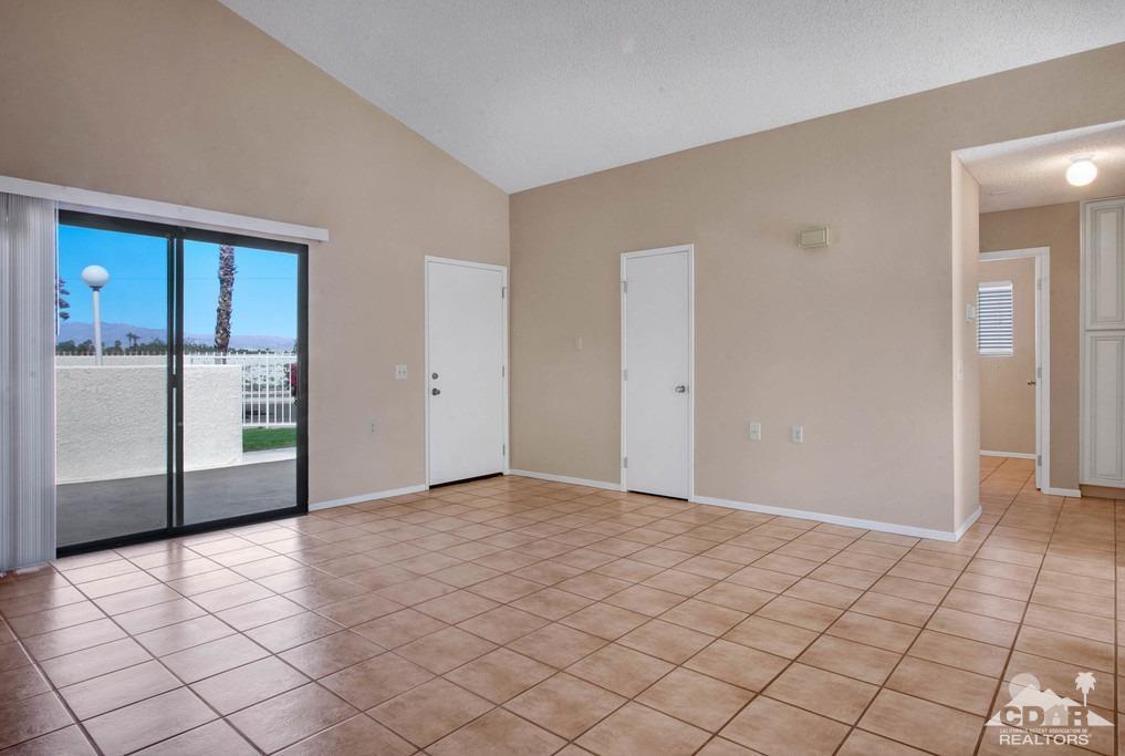 34041 Emily Way Rancho Mirage, CA 92270 - Photo 12 of 25 an empty room with windows