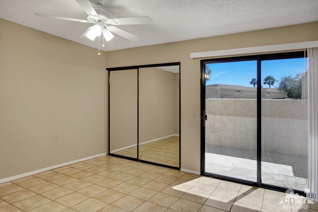 34041 Emily Way Rancho Mirage, CA 92270 - Photo 14 of 25 a view of an empty room with a window