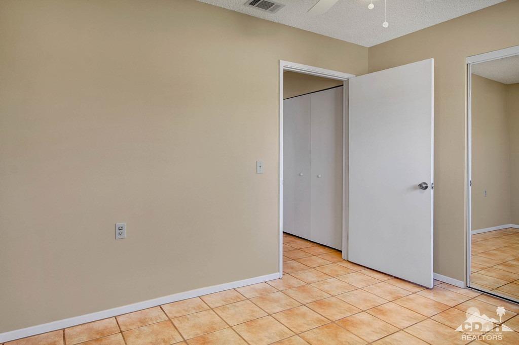 34041 Emily Way Rancho Mirage, CA 92270 - Photo 19 of 25 a view of an empty room
