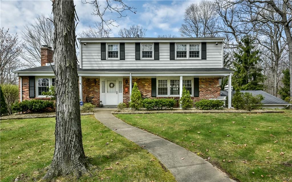 Quality built sprawling Colonial with great curb appeal.