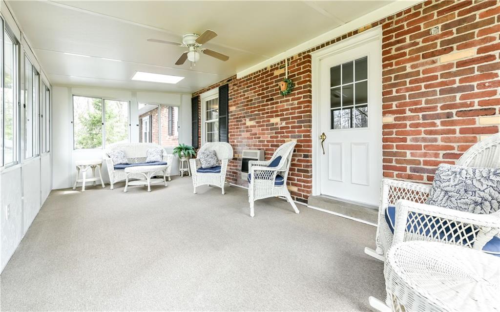 210 Woodcroft Road Economy, PA 15005 - Photo 11 of 25 Heated sun room can be used all year round.