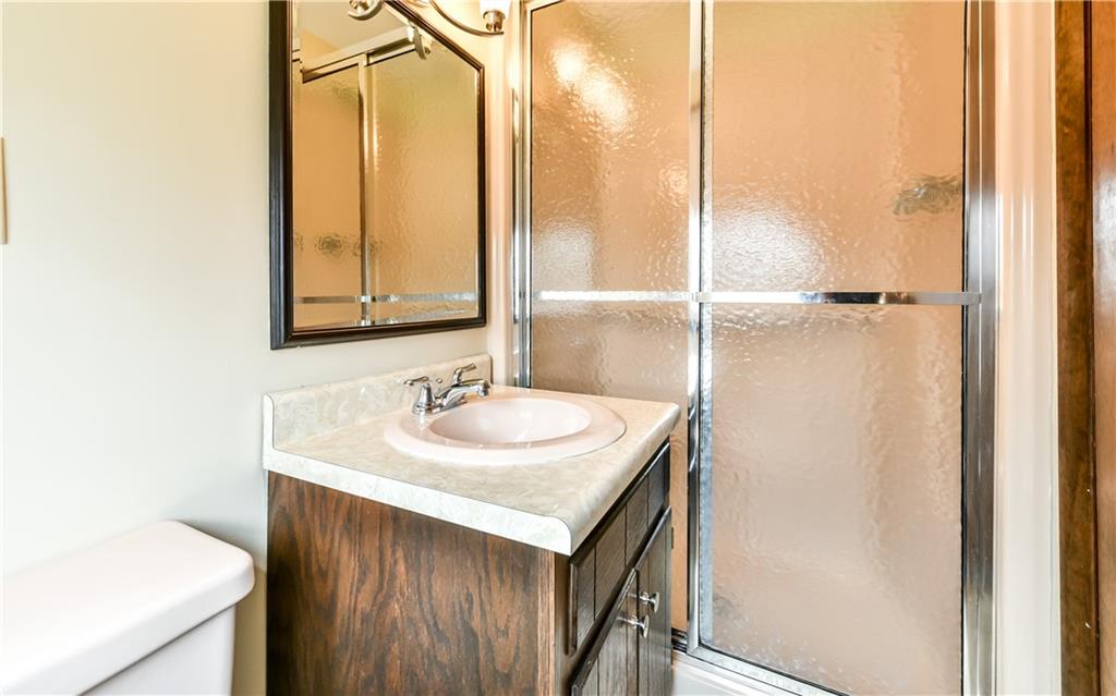 210 Woodcroft Road Economy, PA 15005 - Photo 14 of 25 Master bathroom with step in shower.