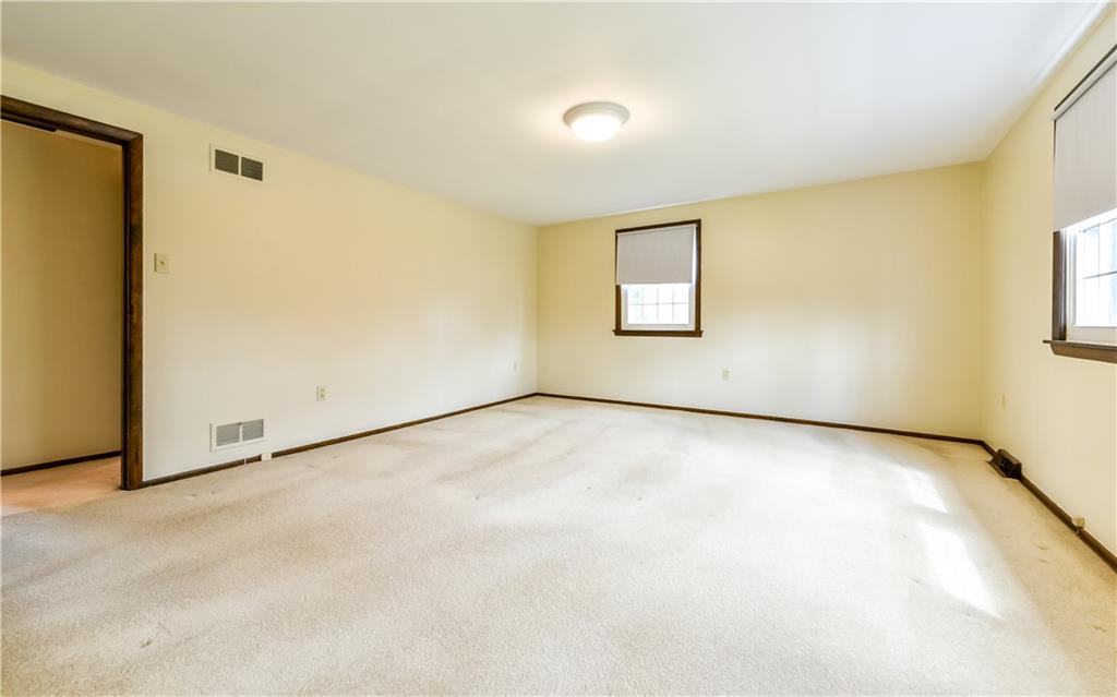 210 Woodcroft Road Economy, PA 15005 - Photo 15 of 25 Spacious bedrooms with overhead lighting.