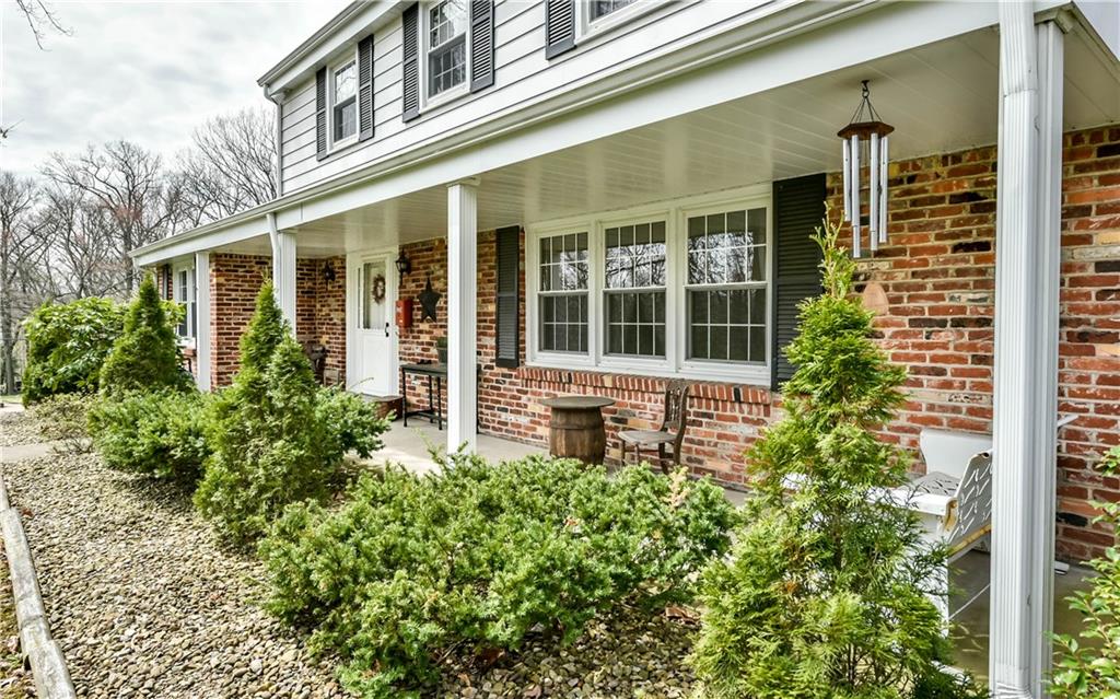210 Woodcroft Road Economy, PA 15005 - Photo 3 of 25 Country style front porch.