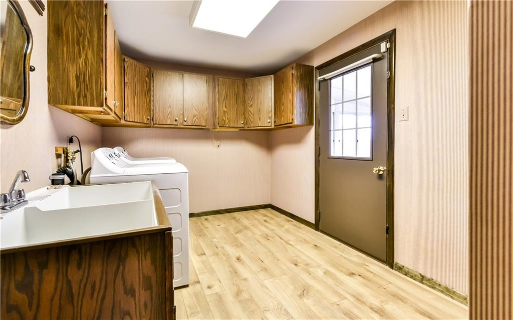 210 Woodcroft Road Economy, PA 15005 - Photo 8 of 25 Laundry room conveniently located on main level off of kitchen.