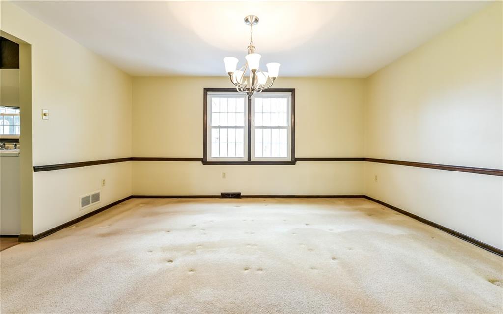 210 Woodcroft Road Economy, PA 15005 - Photo 10 of 25 Oversized formal dining room with easy access to kitchen.