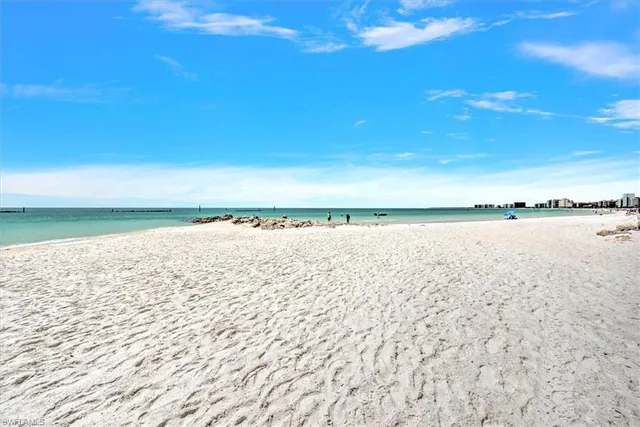a room with gym equipment and windows